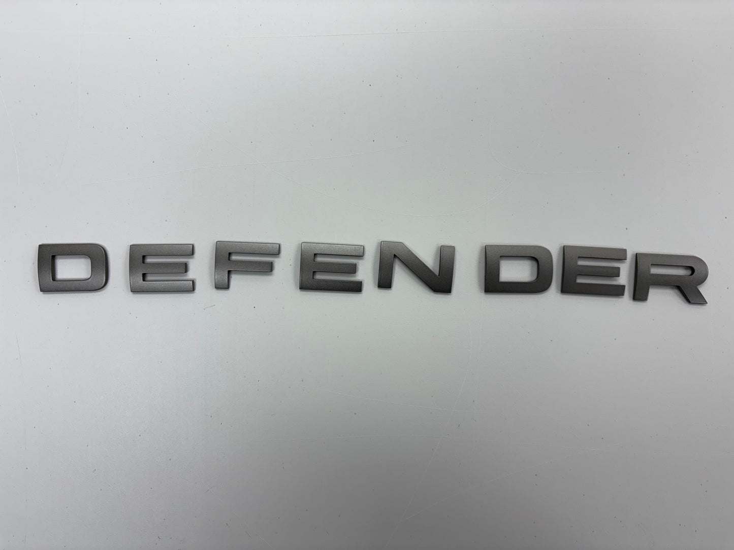 Land Rover Defender L663 2020-up Single pack Emblem tape kit.